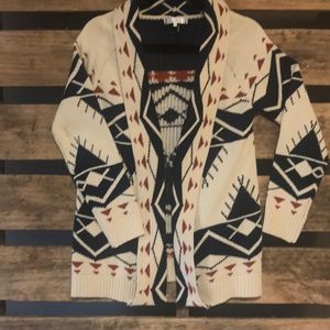 Sweater, roll collar detail with design print